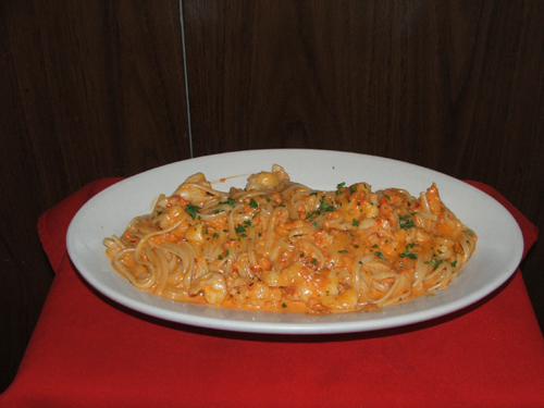 Linguini Cape Sante with scallops, cream and brandy.