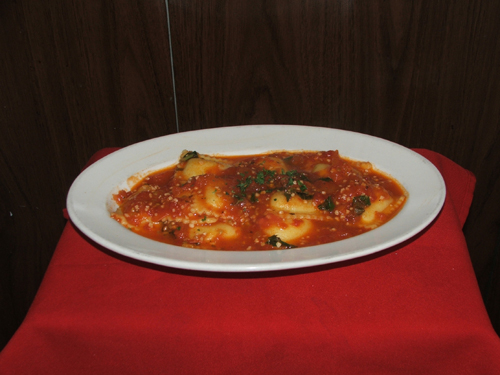 Ravioli Pomodoro. Stuffed beef or cheese with basil and tomato sauce.