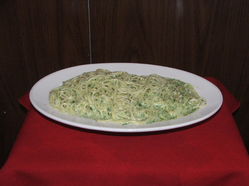 Spaghettini Al Pesto with green pesto sauce.