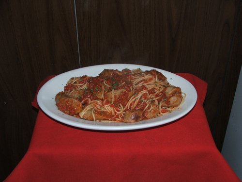 Spaghettini with Italian Sausage and tomato sauce.