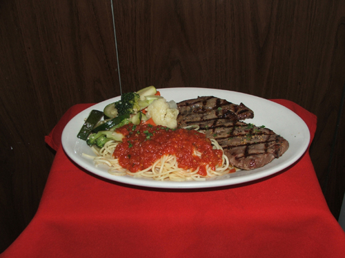 Trancia Di Carne A La Griglia. Ribeye steak grilled.